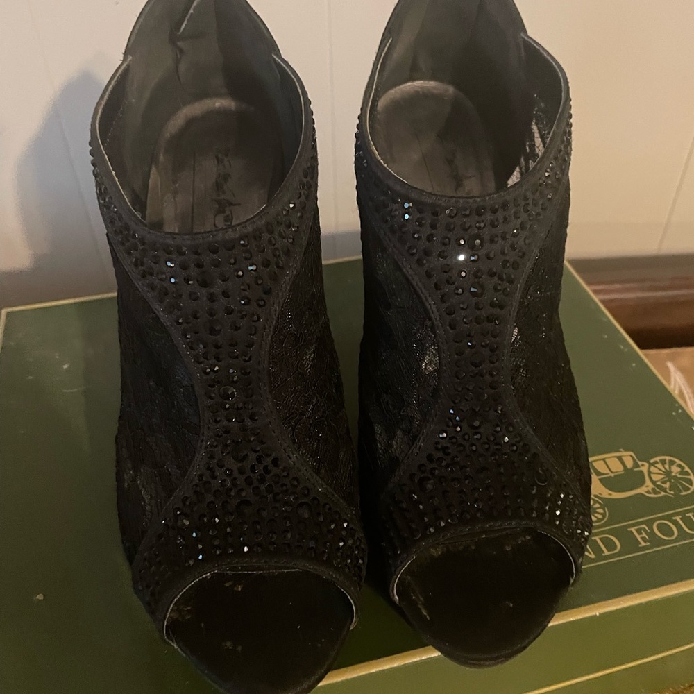Coach and Four lace peep toe.
